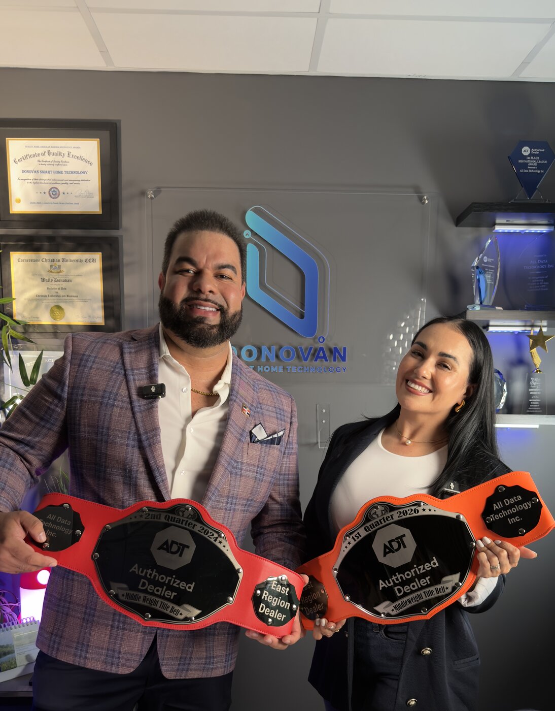 Donovan Smart Home Technology leadership holding ADT Authorized Dealer award belts